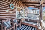 Private 6 person hot tub on the covered porch with Lake Michigan views